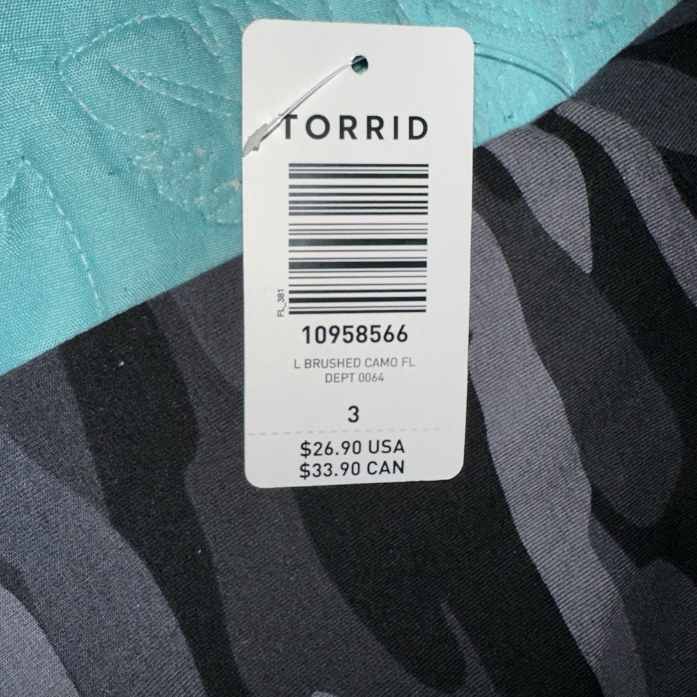 These are a pair of leggings by torrid size 3 camo print